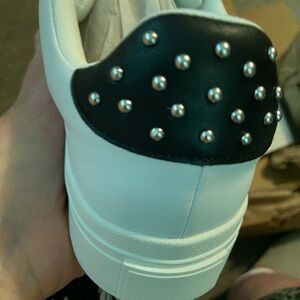 Sneakers size 11, feels like a size 10 in small